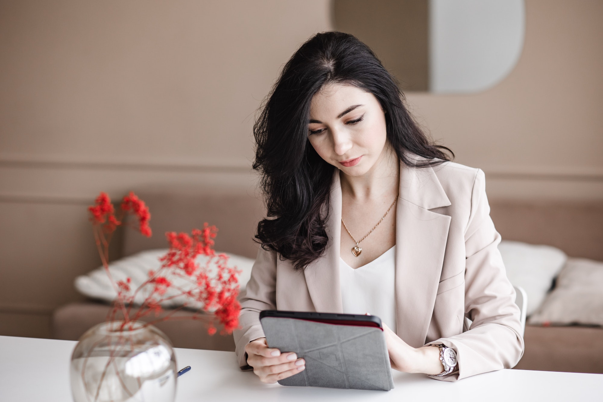 attractive girl working on a tablet