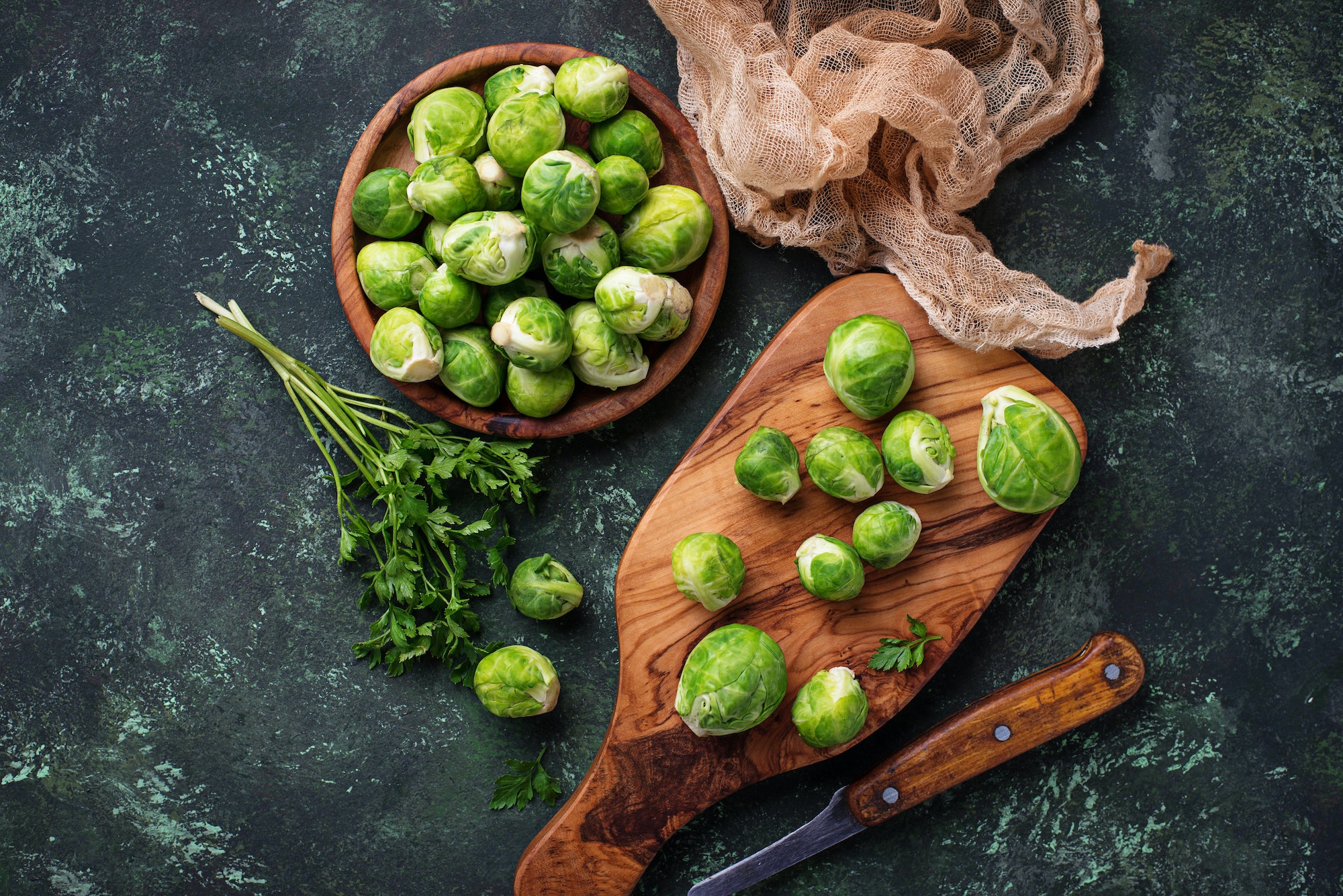 Brussels sprouts on green concrete background